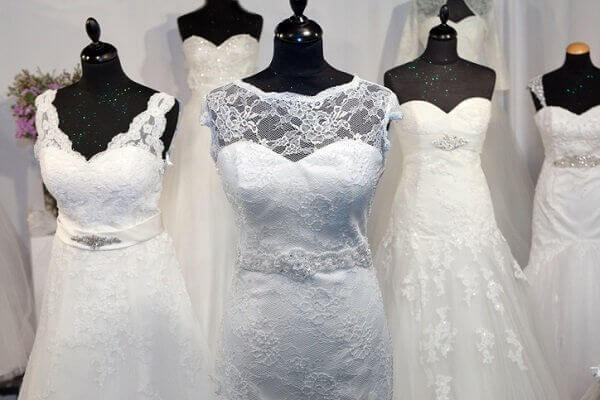 wedding dresses on rack